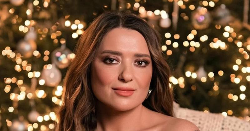 Могилевська разом із чоловіком та дітьми вирушила за кордон і була помічена в аеропорту з родиною.